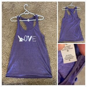Women’s XL sleeveless.  Never worn.  Dental shirt